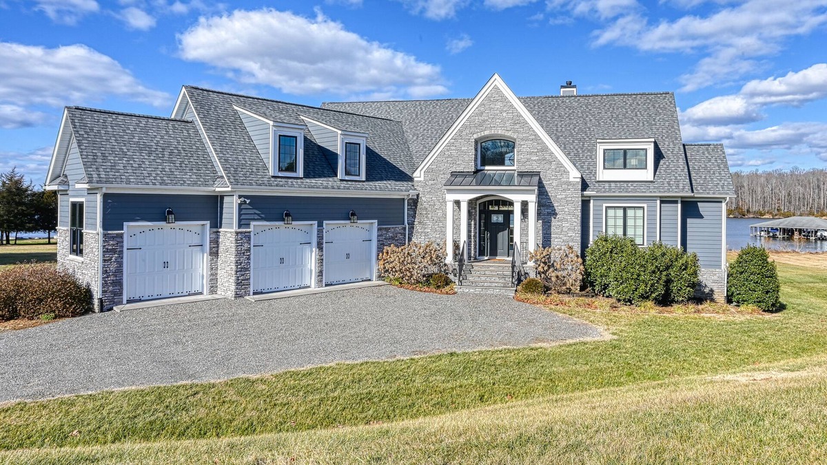 Livingston House | Elegant lakefront home with water access, hot tub, dock, rec room & fireplaces