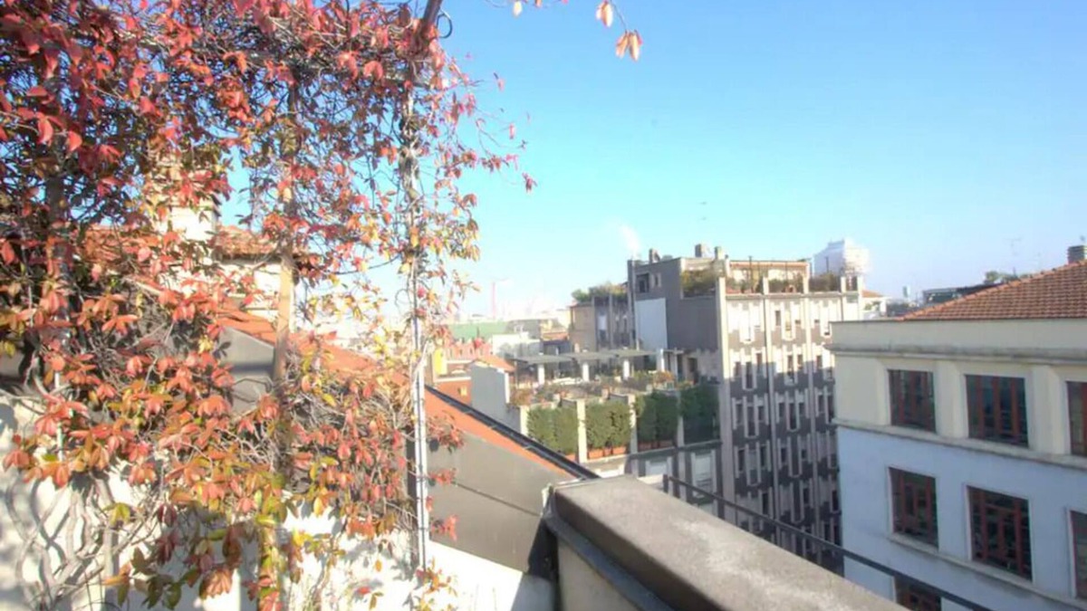Carrobbio Apartment | Elegant loft with cathedral terrace and park view