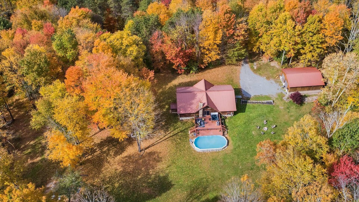 South Gibson Ski Chalet | Elegant log chalet w/hot tub sitting on 36 private acres