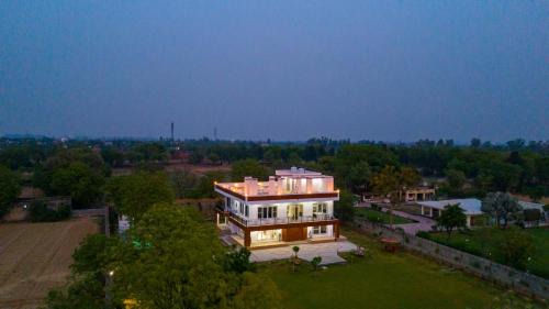 Faridabad Villa | ELIVAAS 3 BHK Amber Villa With Pvt Pool, Game Room & Studio Rooms