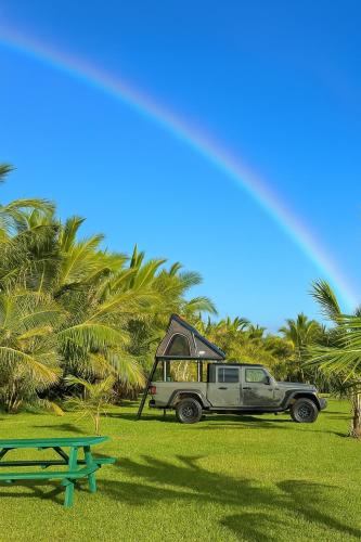 Paia Other | Embark on a journey through Maui with Aloha Glamp's jeep and rooftop tent allows you to discover diverse campgrounds, unveiling the island's beauty from unique perspectives each day