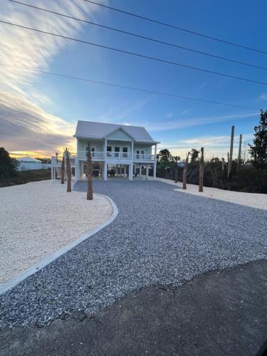 Port St. Joe Villa | Emerald Coast Retreat 2 4person golf carts large swim spa included