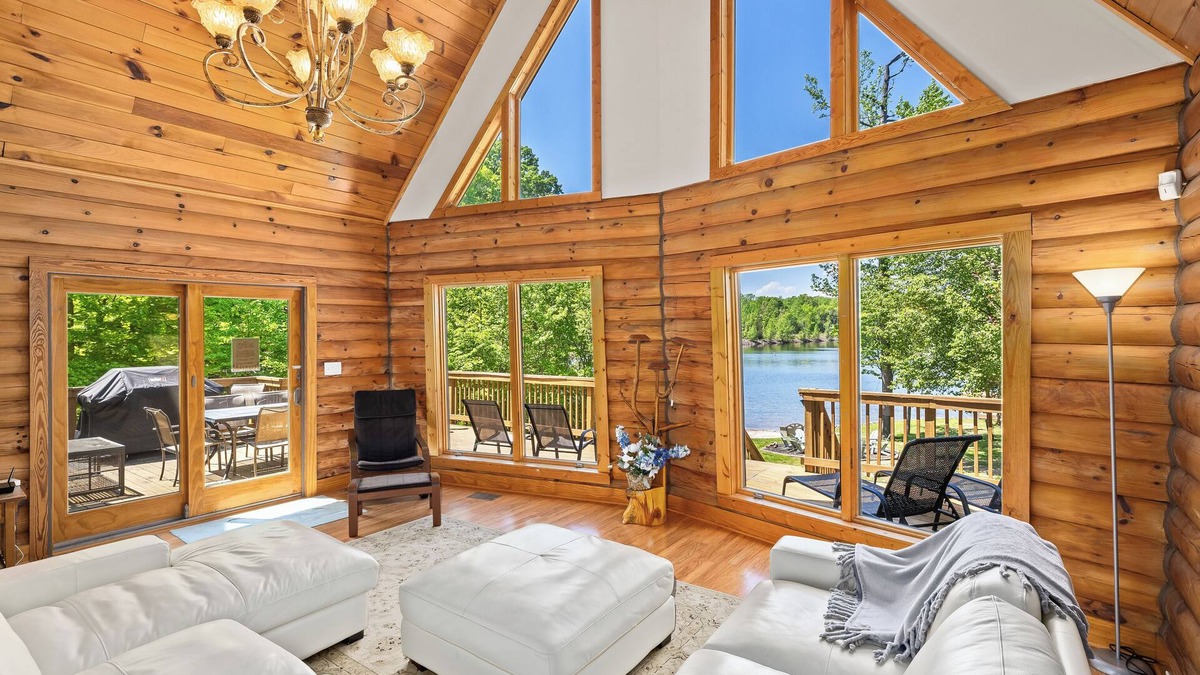 Bumpass Cabin | Enchanting 5-Bed/5-Bath Lakefront Log Cabin with Private Cove and Sandy Beach.