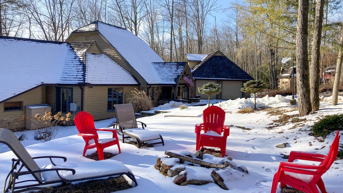 McHenry House | Enchanting waterfront home with hot tub, game room, fireplace, & washer/dryer