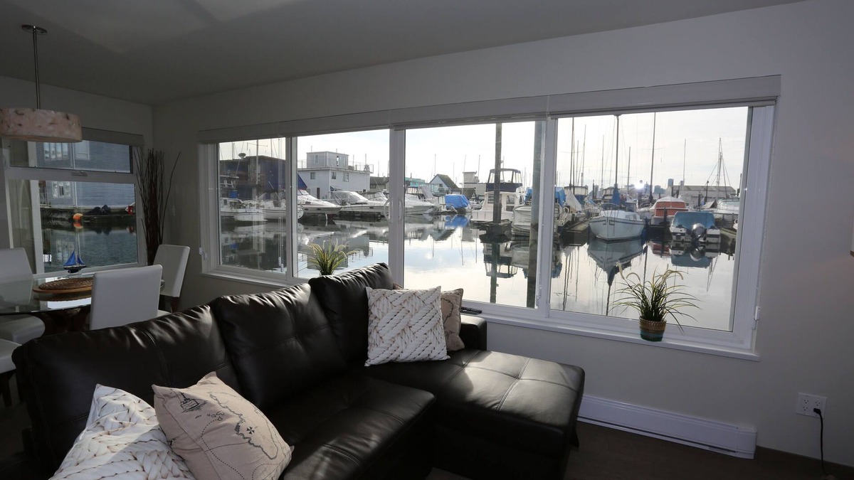 Lower Lonsdale Boat Rental | Encounter paradise at the oceans edge in a high-end floating home! Pets welcome.