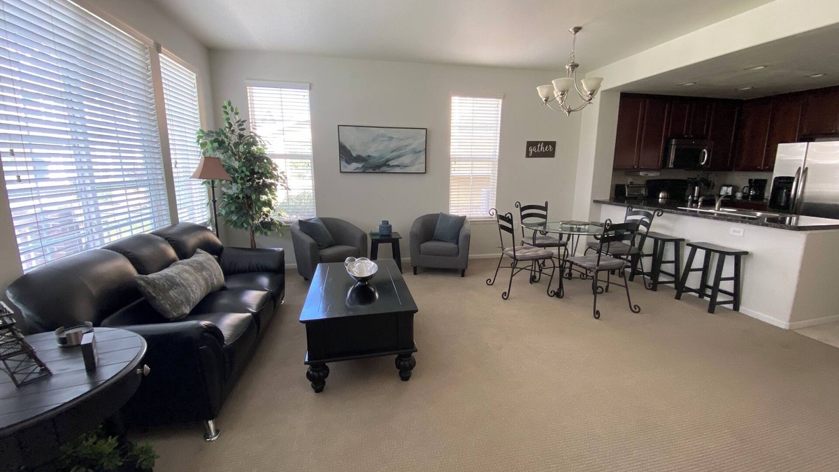 Aurora House | End-unit townhome with garage, patio, and office, near shopping and trails!