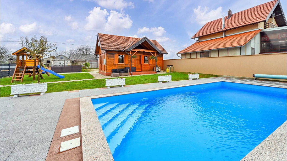Zasadbreg House | Enjoy a fantastic view of the countryside in this inviting vacation home with pool!