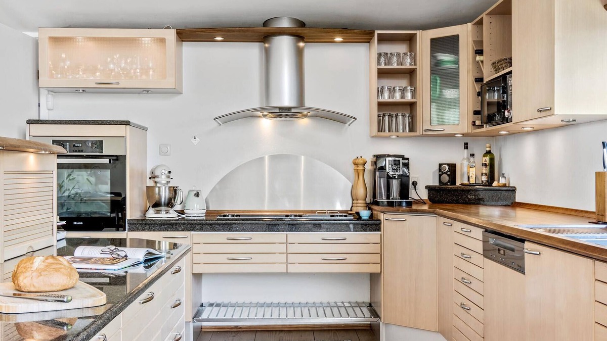 Daugard House | Enjoy a relaxing holiday in this holiday home with sea views near Vejle Fjord.