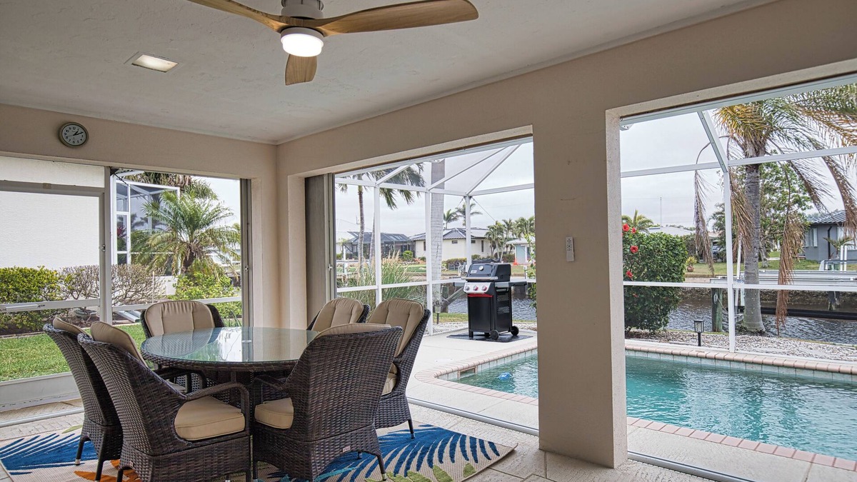 Punta Gorda House | Enjoy a tranquil vacation on expansive canal with passing boats and heated pool.