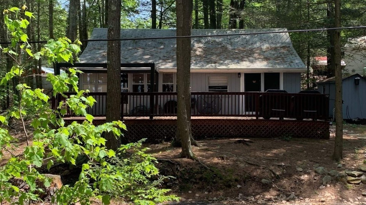 Northwood Cottage | Enjoy being serenaded by loons at this rustic Northwood lake view cottage!