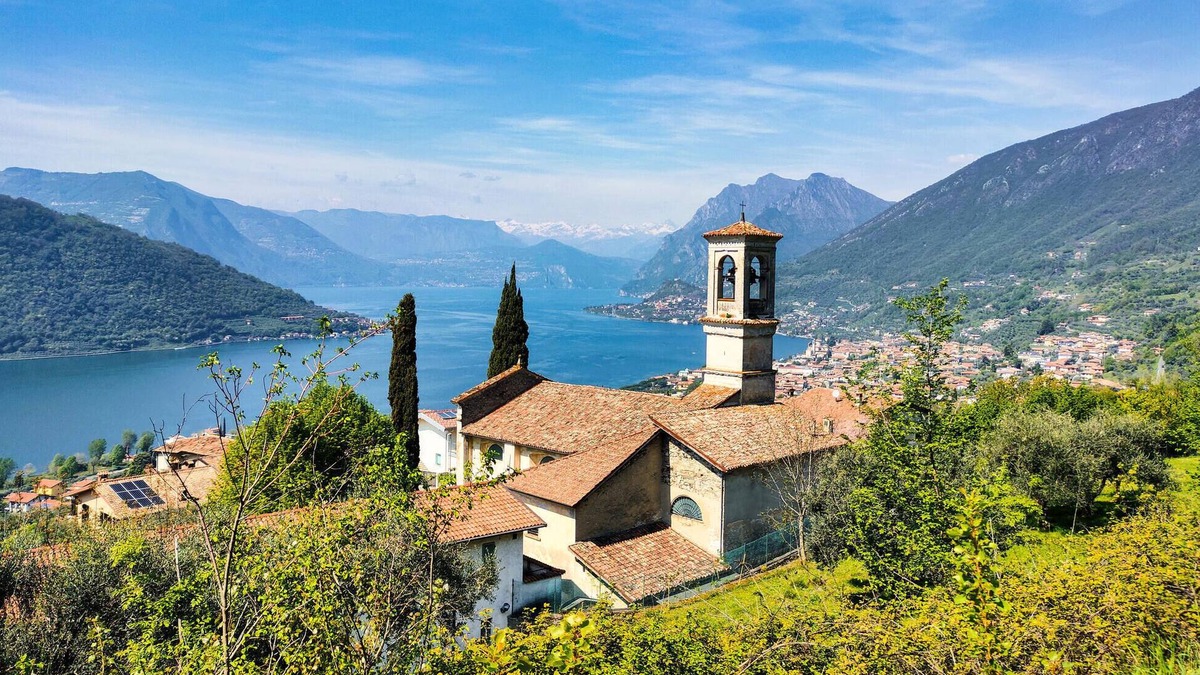 Sovere Apartment | Enjoy the beautiful view of the countryside and this comfortable vacation apartment.