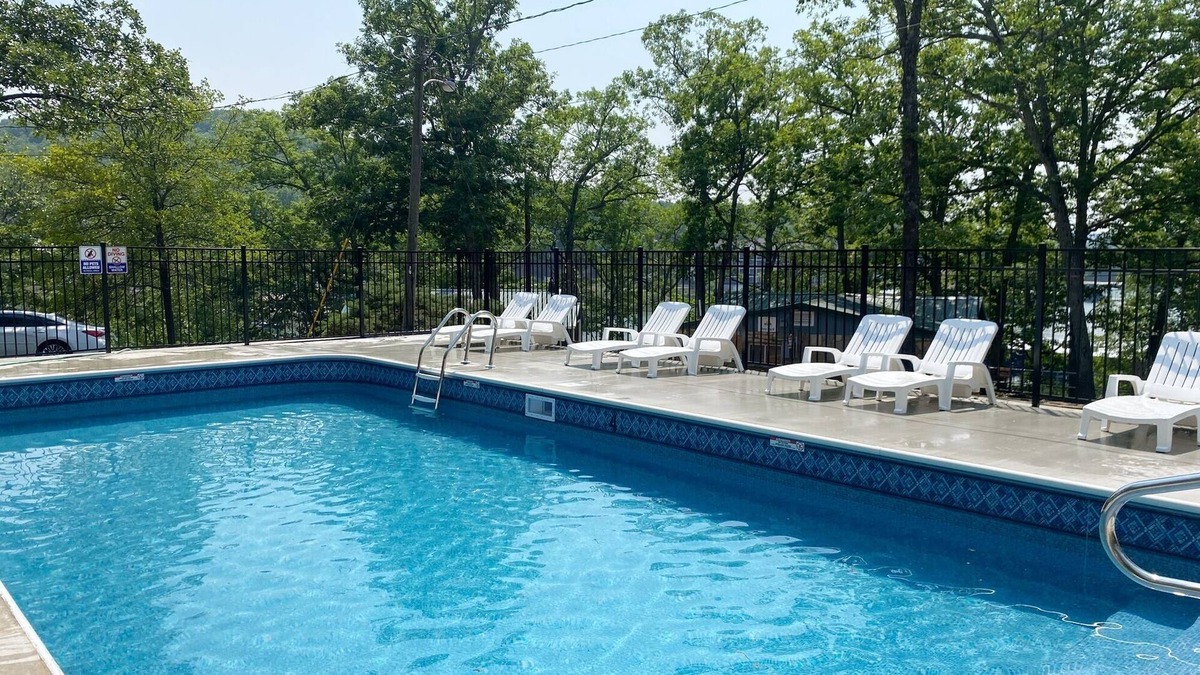 Camdenton Cabin | Enjoy the Quiet Side of the Lake With Resort Amenities + Pool.