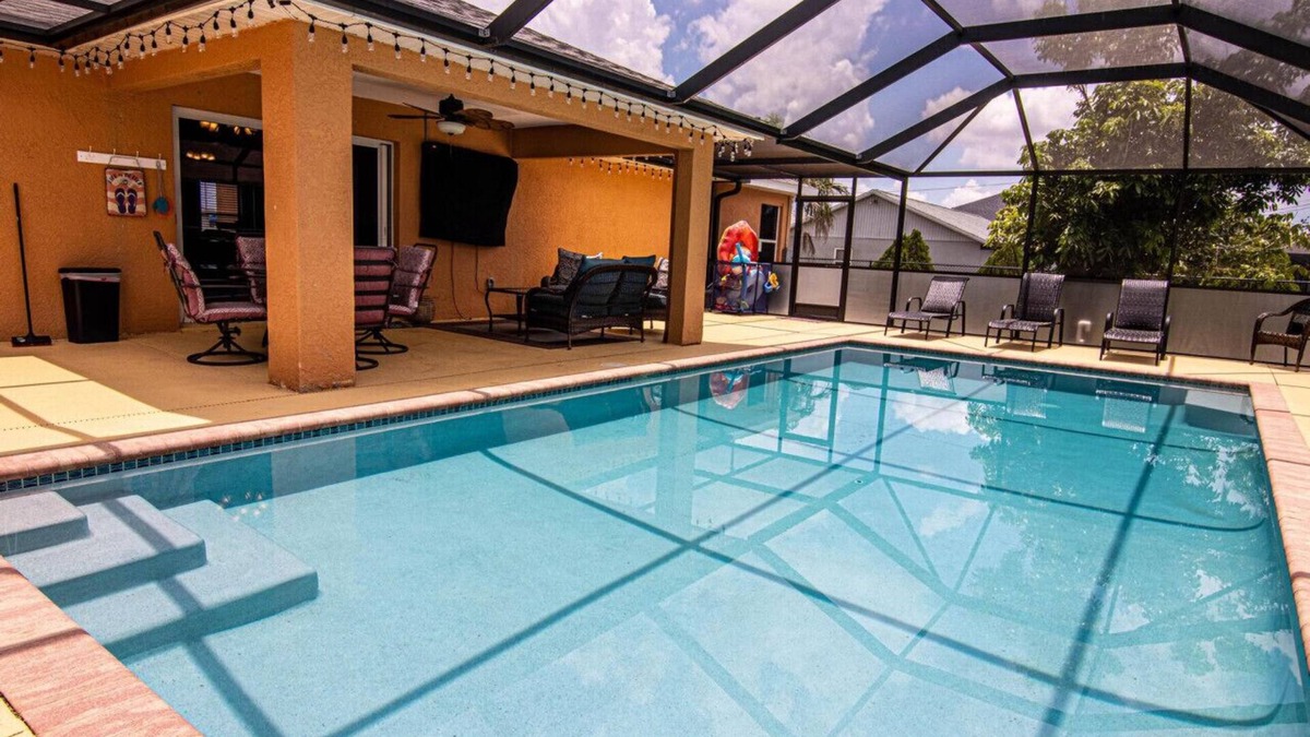 Diplomat House | Enjoy the Salt Life with this Heated Saltwater Pool and outdoor lanai.