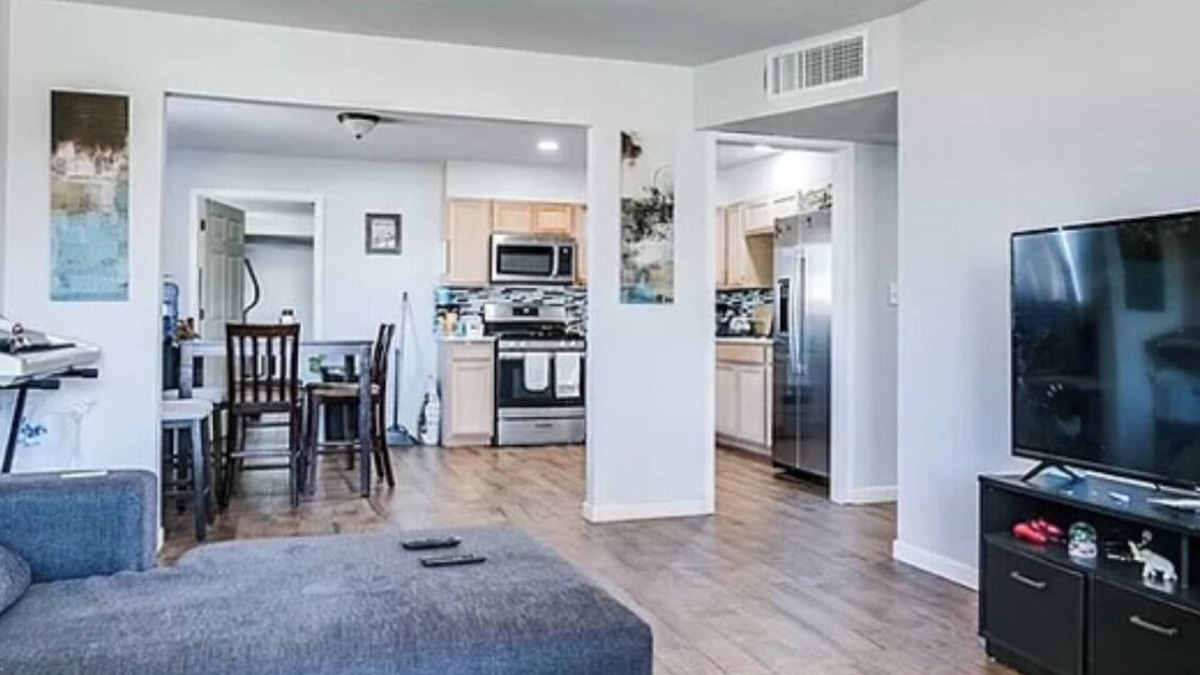 San Angelo House | Enjoy this beautiful wood floor and more!