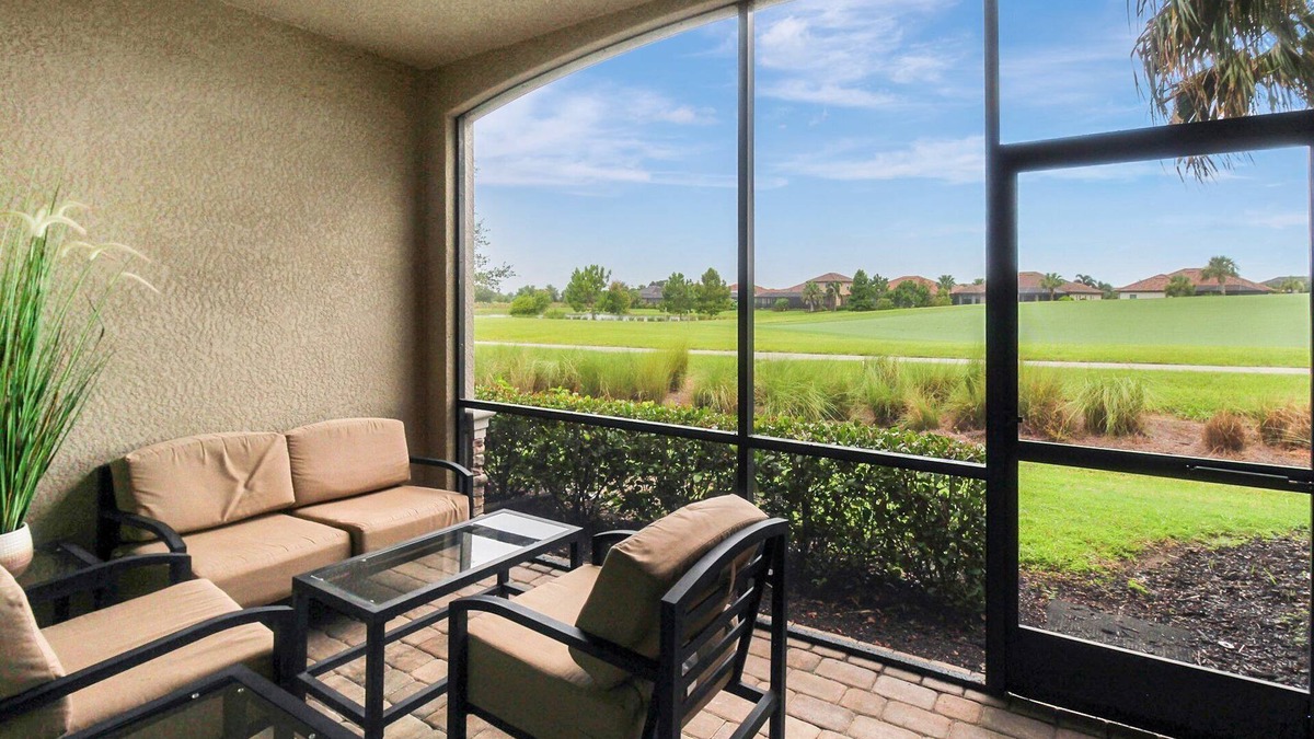 Lakewood Ranch Condo | Enjoy views of the immaculate green from your screened lanai at Lakeside National - Golfside Escape