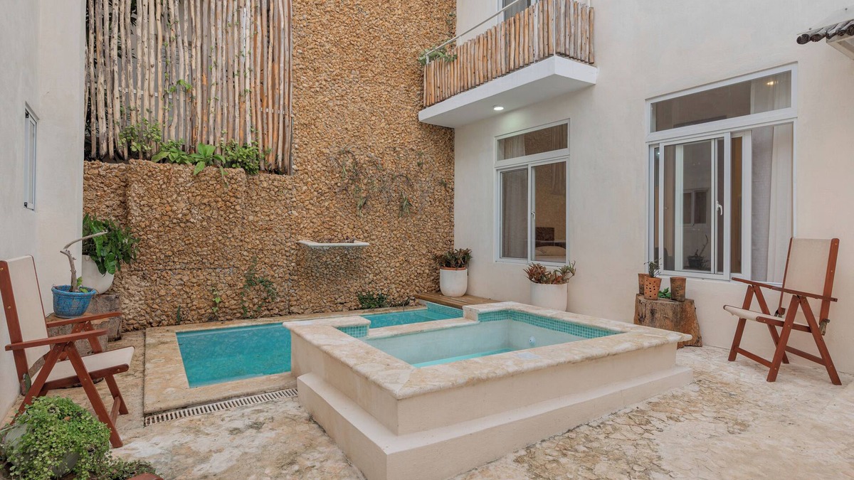 Zona Colonial Apartment | Enriquillo 2-bdrm apt with ensuite baths, full kitchen, and cozy living room.