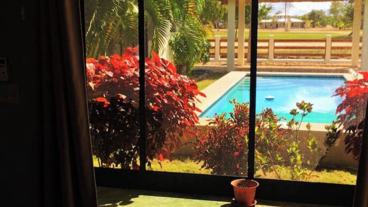 Corozal Apartment | Entire House, Privacy, Pool, Canal, Ocean Views, Kitchen, AC's, Dock, Sleeps 9