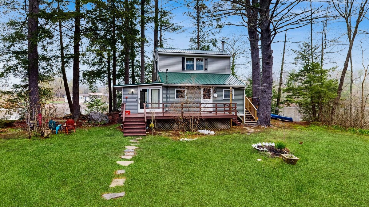 Augusta Cabin | Entire lakefront home on Togus Pond with decks, canoe, firepit & great view