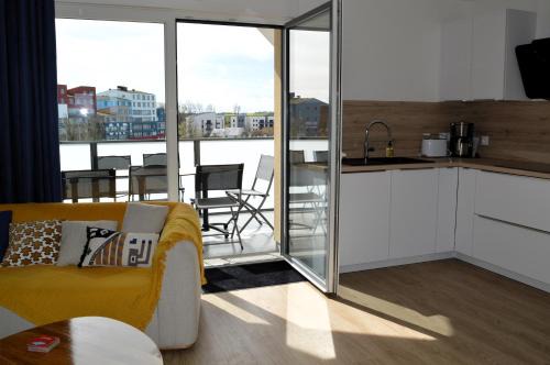 Courseulles-sur-Mer Apartment | Entre Plage et Ports, Le 49 - avec balcon 4 étoiles