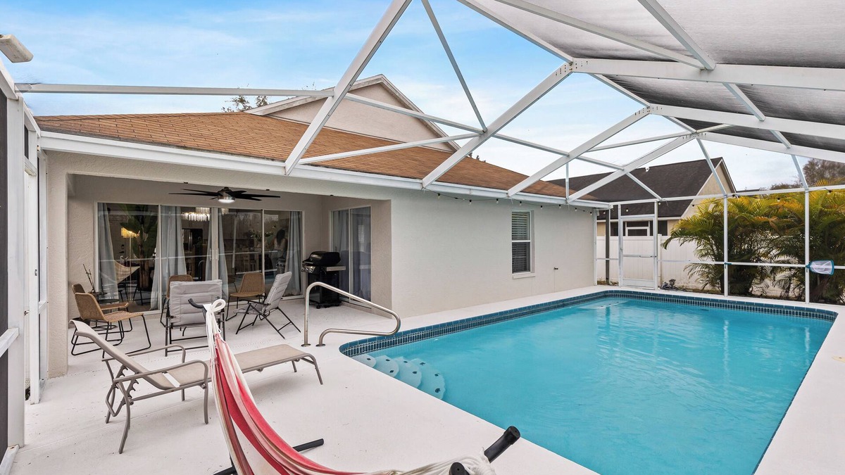 Lutz House | Escape to Florida Luxury – Lake View Pool Home in Lutz!