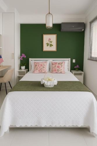 Saude Apartment | Estudio Green Loadd