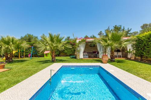 Roumeli Villa | Eva & Dimitrios Villas, Captivating Oasis with Pools & BBQ, By ThinkVilla