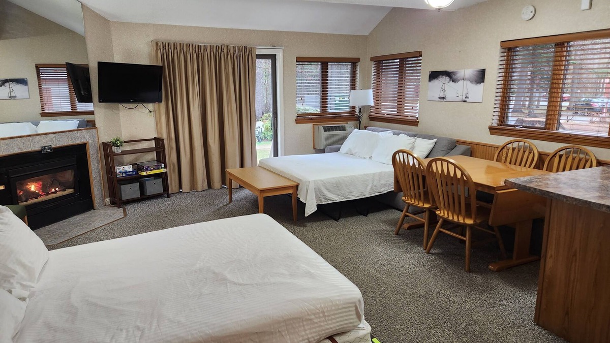 Bartlett Condo | Evergreen Lodge at Attitash Mountain base, ski, hot tubs, pool, WIFI & Fireplace