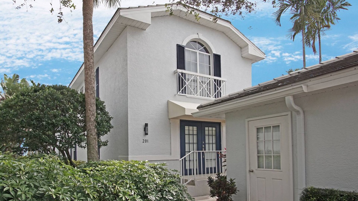 Pelican Bay Condo | Exclusive Pelican Bay, 2 BR + Den with Garage, 2nd Floor Unit in Barrington Club