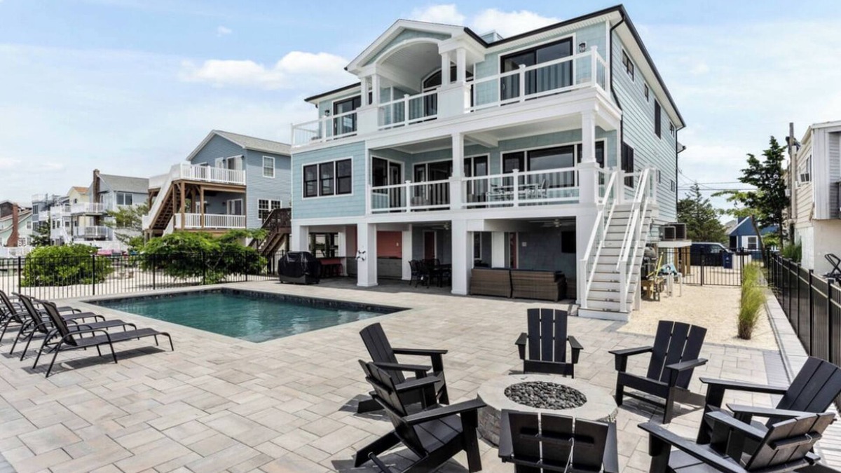 Ship Bottom House | Expansive Bayfront Home w/Heated Saltwater Pool & Dock