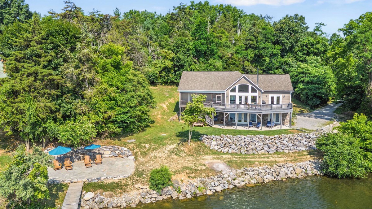 Pulaski House | Experience the perfect blend of rustic charm and modern luxury in this Claytor lakefront retreat