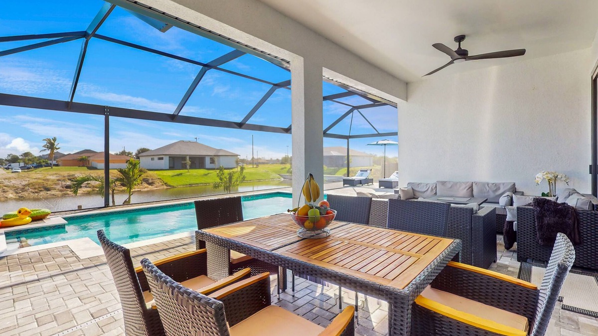 Diplomat House | Exquisite riverfront home with pool, lanai, fireplace, W/D, 7 dog-friendly