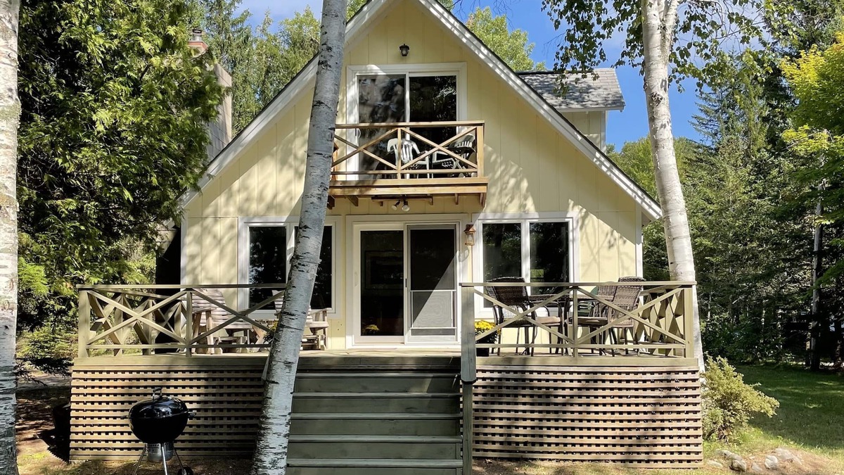 Lake Leelanau Cottage | Fall 2025 open, stunning, cozy, sunset waterfront on N Lake Leelanau.