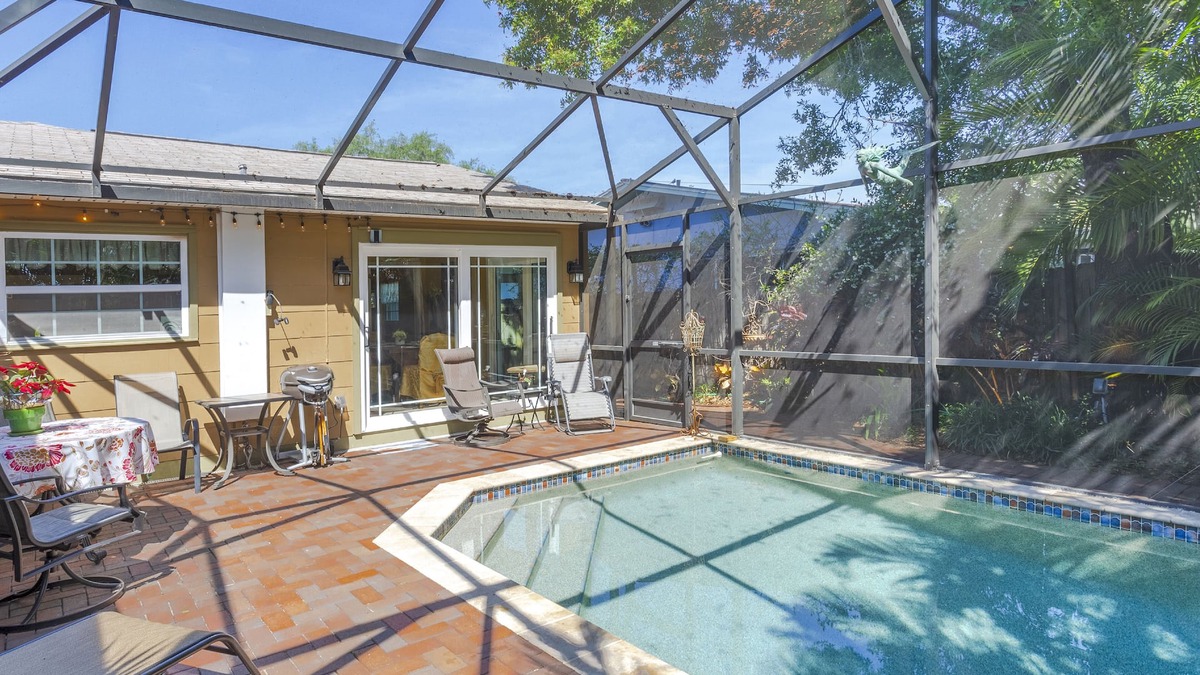 Gulfport Cottage | Family and dog friendly beach cottage w/pool & grill in quaint seaside village
