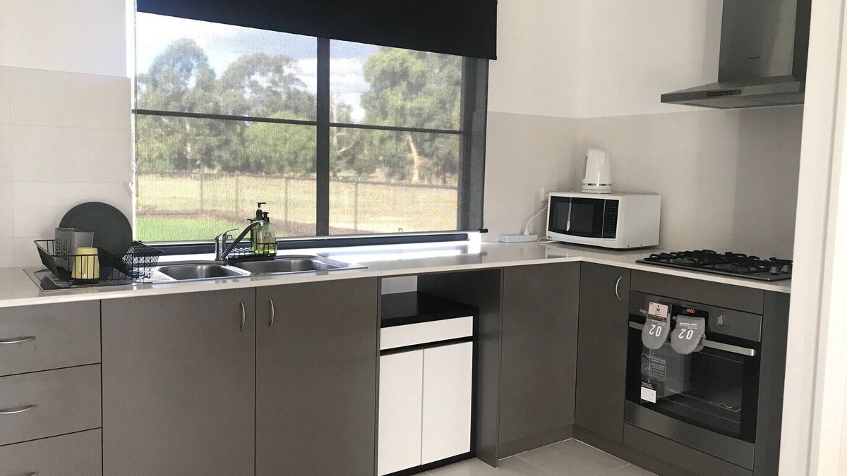 Oakford House | Family Farm Stay with Animals, Playground and Firepit