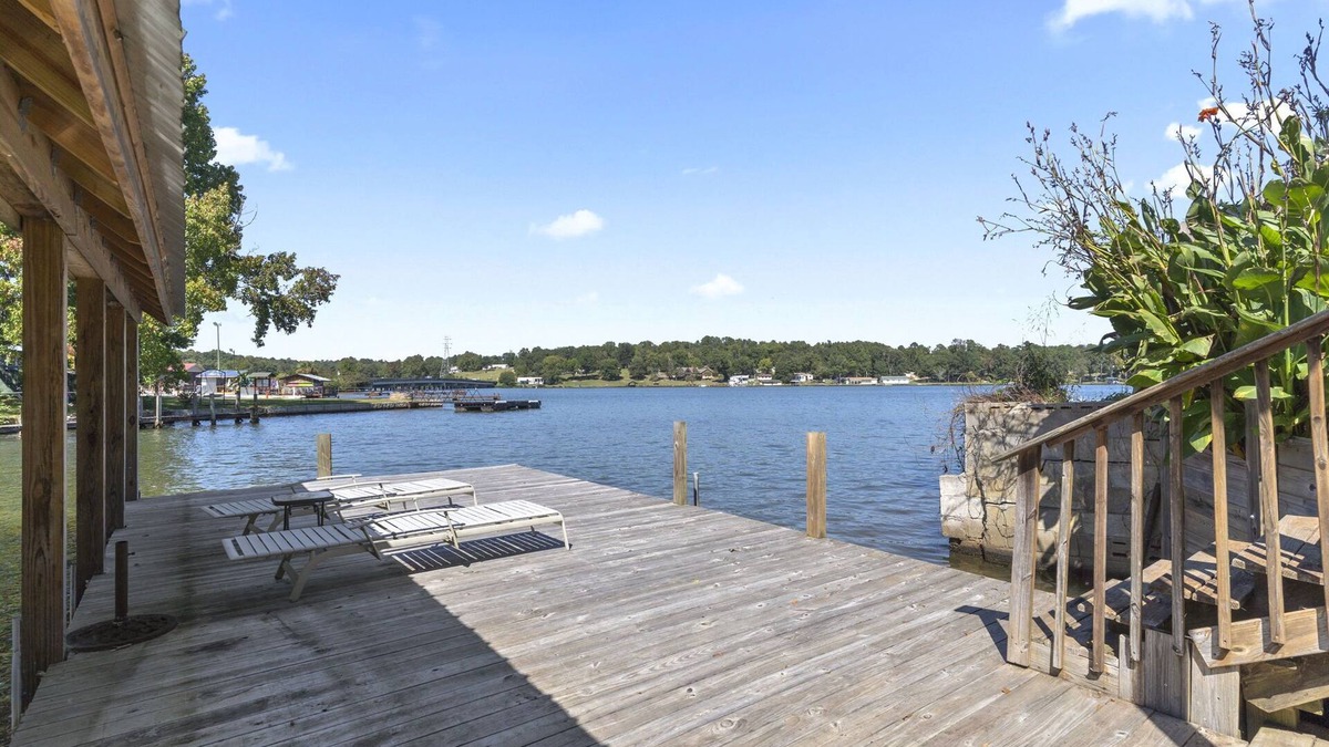 Greenwood House | Family - Friendly Lakefront Home with a Covered Boat-slip.
