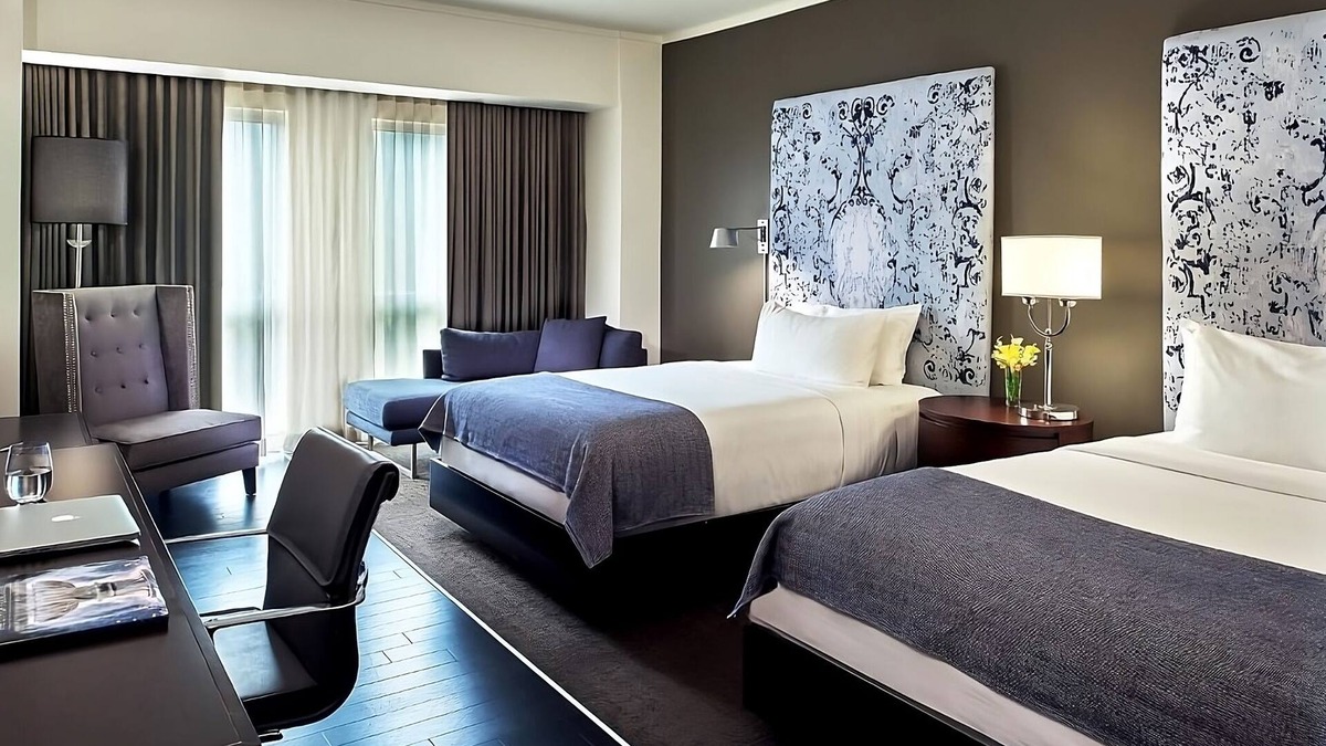 West Plaza Hotel | Family Getaway! 2 Spacious Units, Pool, Pets Allowed Near Rockhurst University!