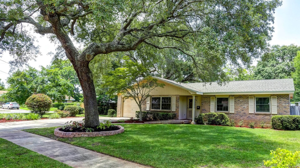 Northeast Pensacola House | Family home , Large salt water pool, not heated, and tropical courtyard