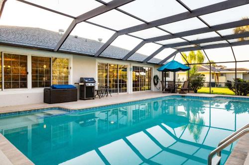 Lochmoor Waterway Estates House | Family-Ready 4BR with Heated Pool & BBQ