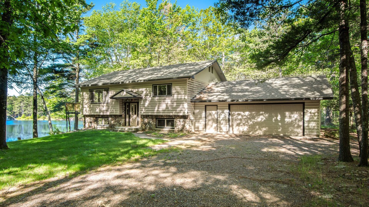 Manitowish Waters House | Fantastic waterfront abode with wraparound deck, dock, & WiFi - dog-friendly