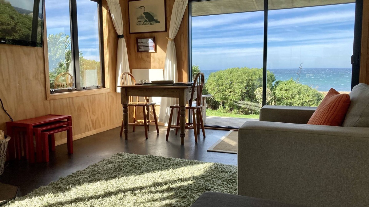 Tora Cottage | Far Side Bach Tora - pristine NZ coastline on your doorstep