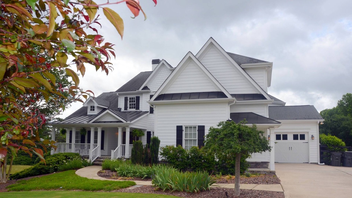 Suwanee Other | Farm Style home with a pool and game room to stretch out and have family fun.