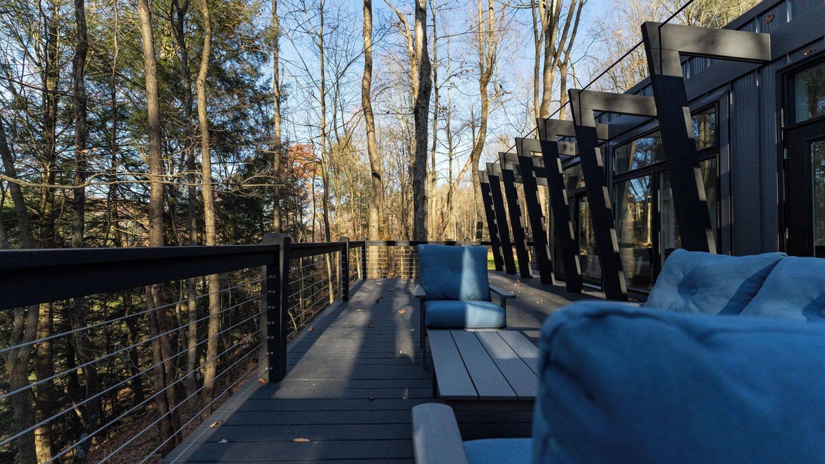 Loudonville Cabin | Fauna Bluff, A cliffside 2-bedroom modern cottage overlooking a bubbling stream.