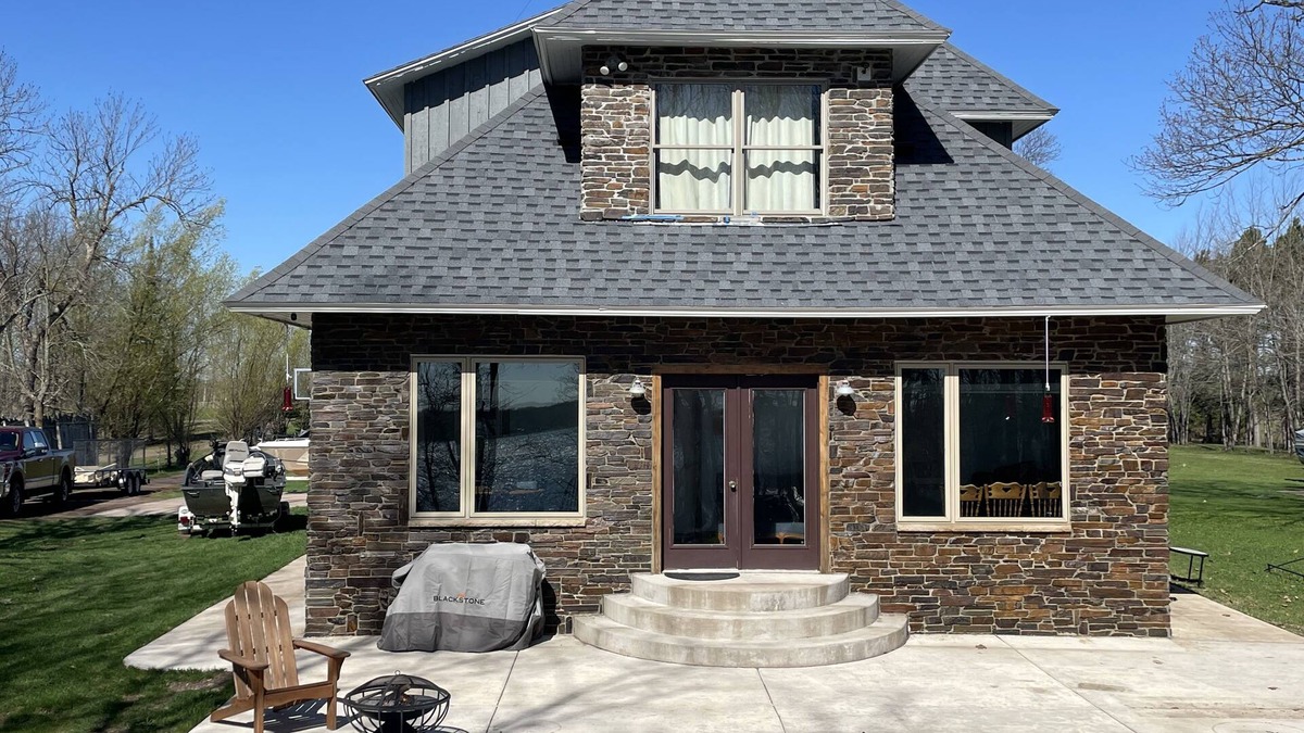 Kerrick House | Ferguson Farmhouses on Oak Lake with 176 feet of shoreline in Kerrick Minnesota.