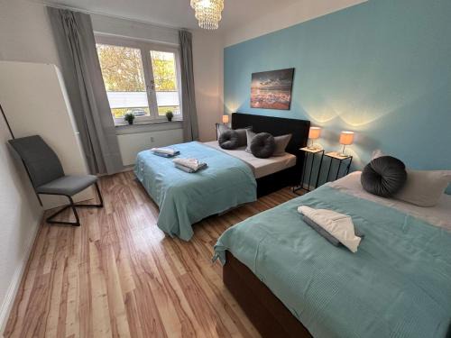 Sudstadt Apartment | Ferienwohnung NORDLICHT mit Balkon und Smart-TV