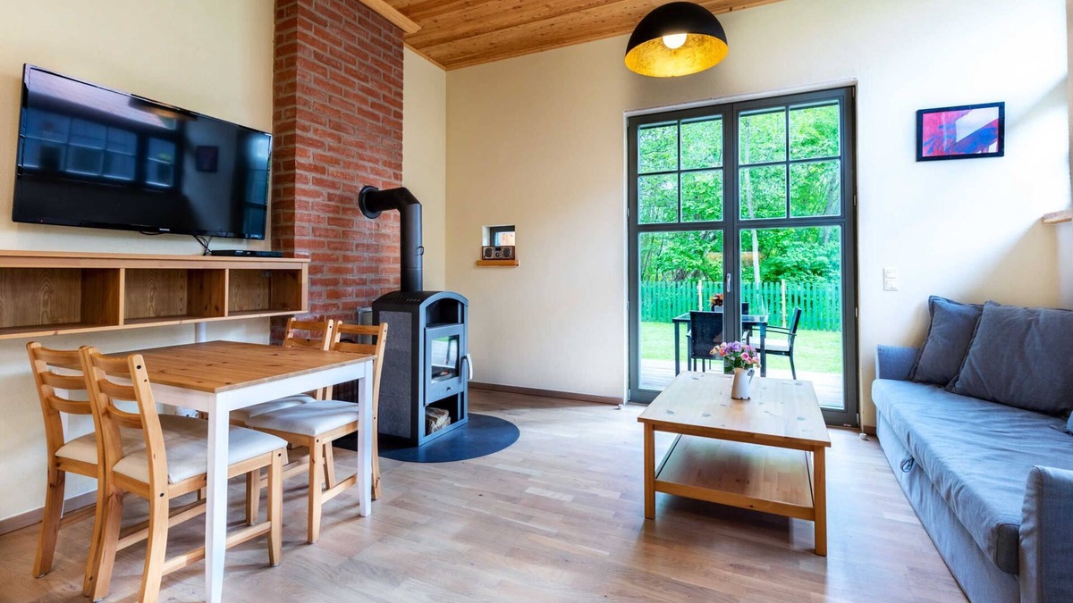 Steffenshagen Apartment | Ferienwohnung Sonne mit Terrasse, Kamin und Garten - Ferienhaus Sonne, Mond und Sterne bei