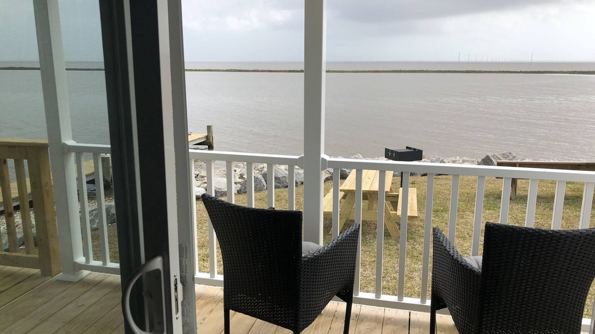 Eastpoint Cottage | (Fishing from dock) Boat launch, seafood market & bait-tackle shop next door.