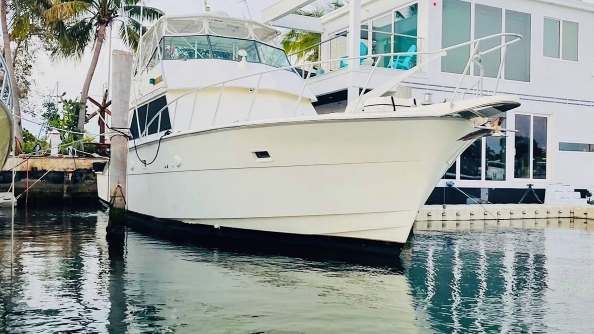 Key West Boat Rental | Floating Island Escape: Spacious 65' Hatteras Boat, Full Amenities & Sun Deck