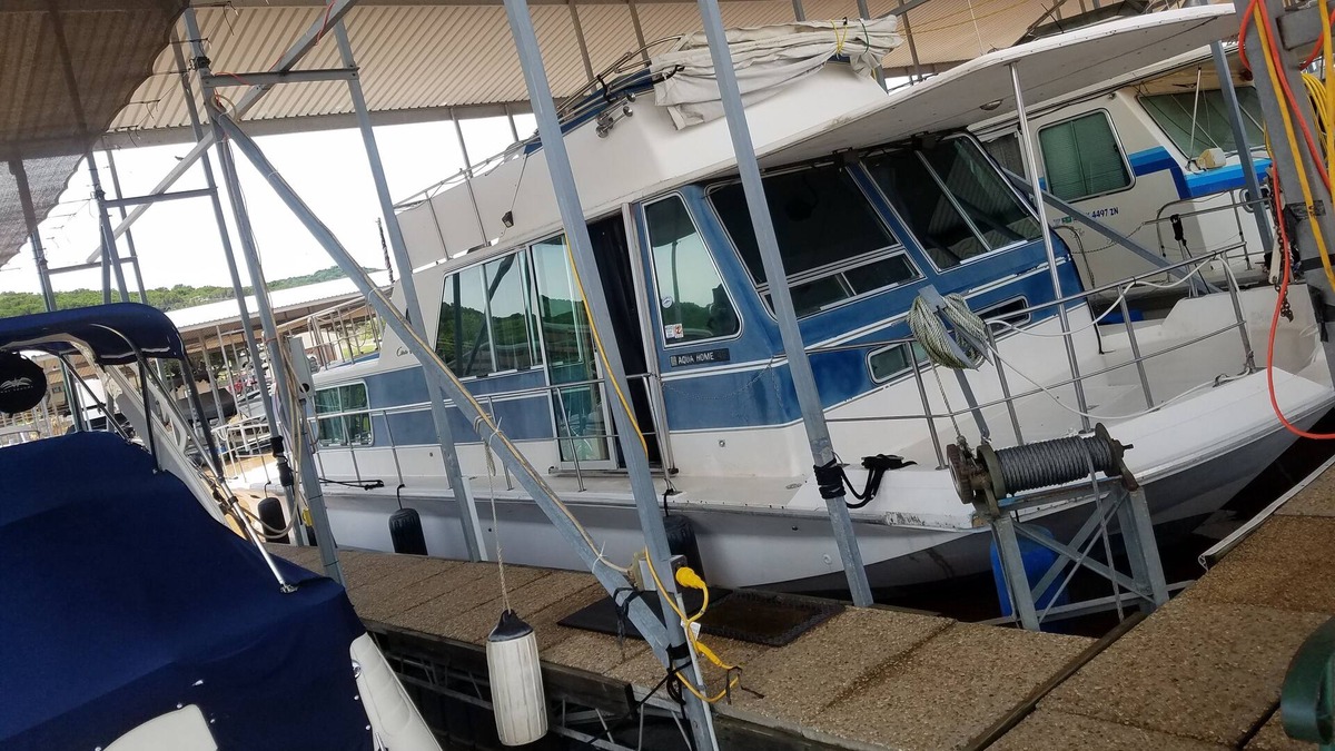 Graford Boat Rental | Floating Lakefront Apartment- Relax on vintage houseboat on Possum Kingdom Lake!