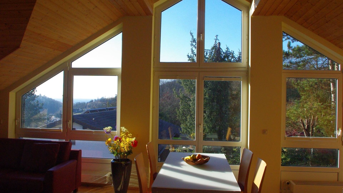 Laudenbach Condo | Flooded with light and a wide view of 100 m2