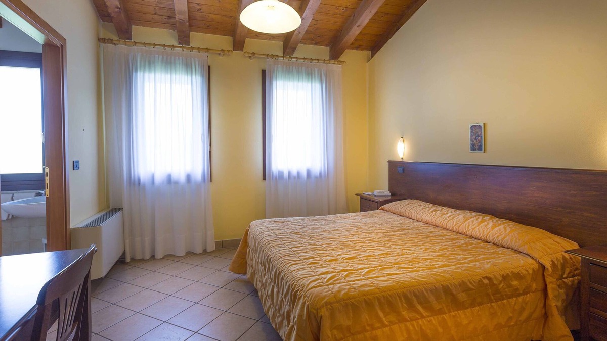 Palazzolo dello Stella Apartment | Folaghe 3, apartment with terrace overlooking the grove